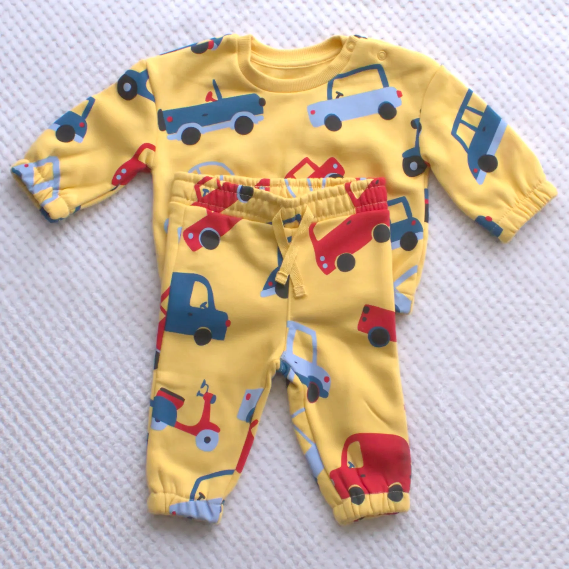 Boys yellow tracksuit with car designs
