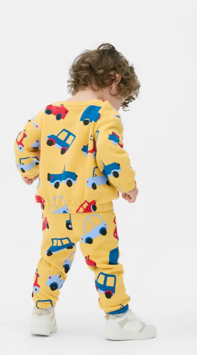 Boys yellow tracksuit with car designs