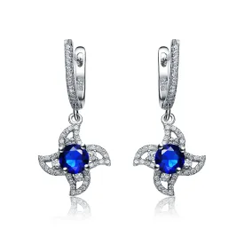 CZ Sterling Silver Rhodium Plated Sapphire Flower Dangling Earrings