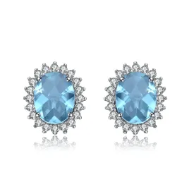 Sterling Silver Oval Ice Blue Cubic Zirconia Solitaire with Halo Burst Earrings